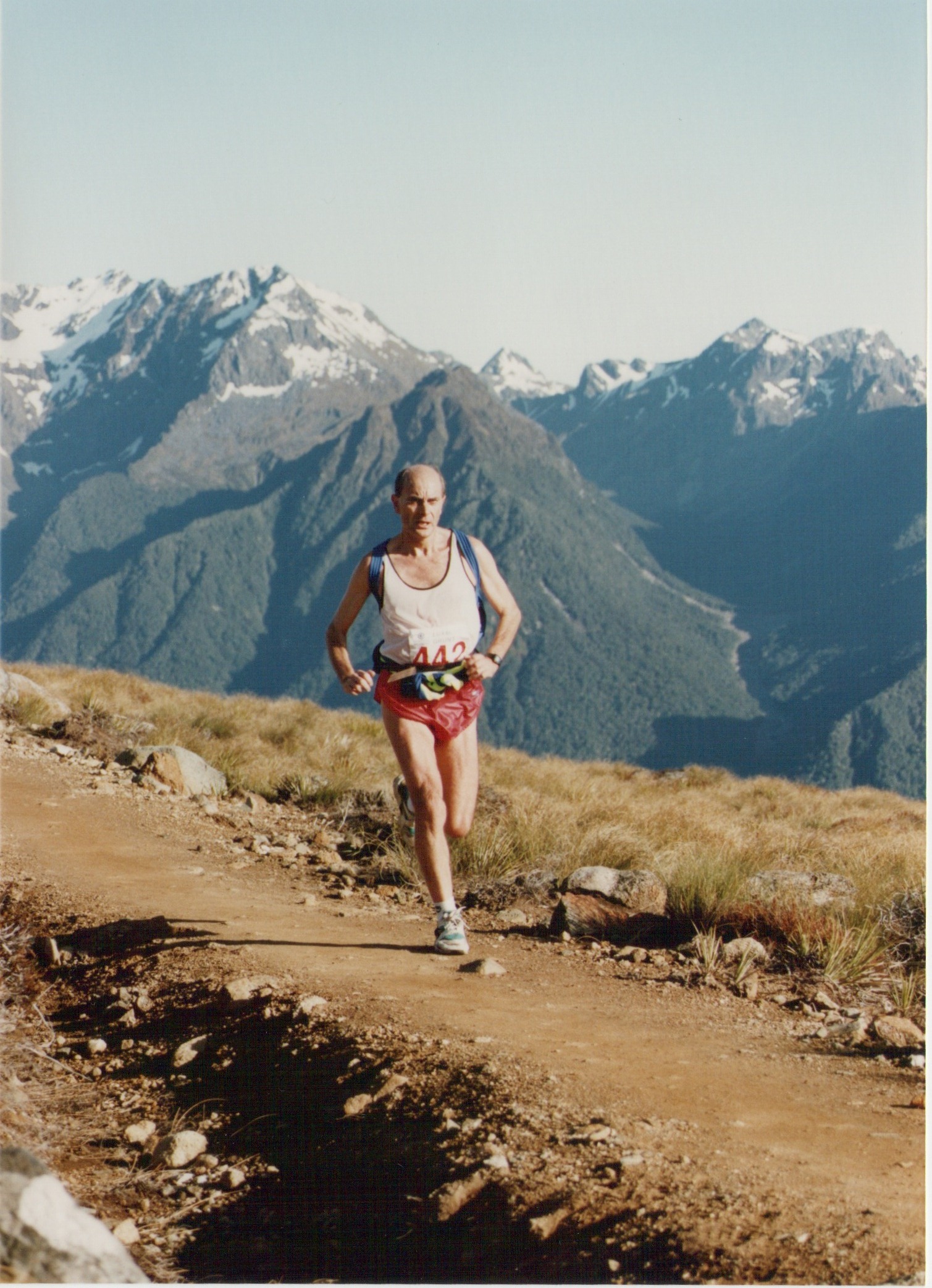 Roger Robinson running among mountains