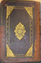 Gold-tooled calfskin binding with date and initials