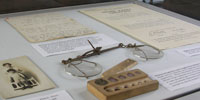 A display of artefacts and documents that once belonged to Sir Fred Hoyle.