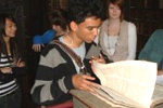 A2 level students looking at Samual Johnson's dictionary