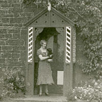 Farmhouse at Addingham, Cumberland with the tenant's wife (and dog)