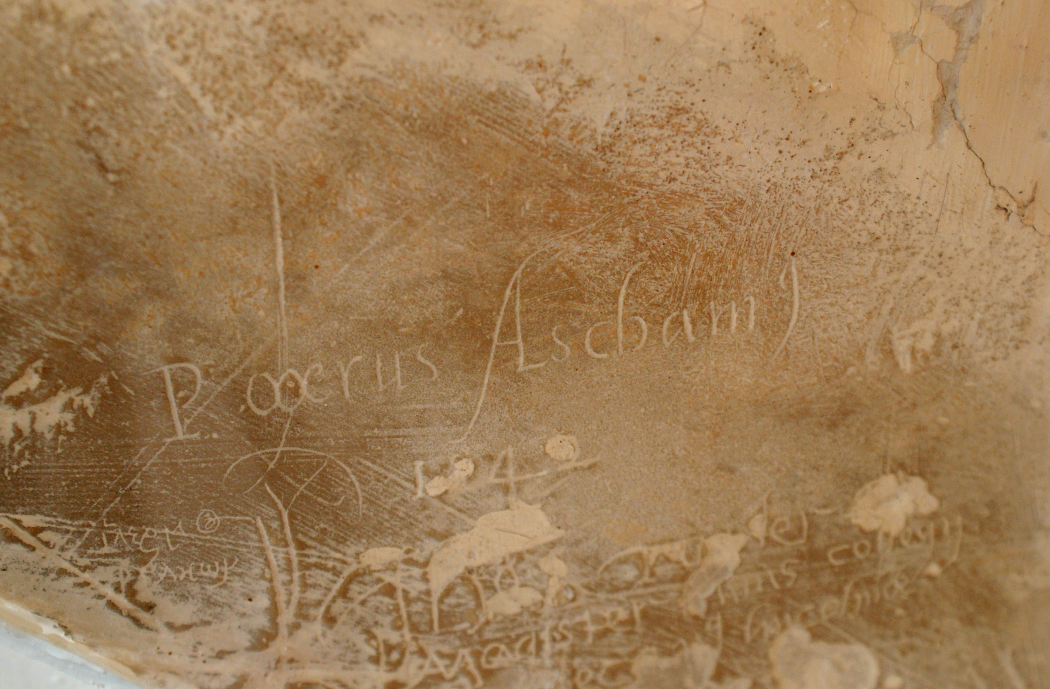 Roger Ascham's signature in the stone of the Old Treasury fireplace