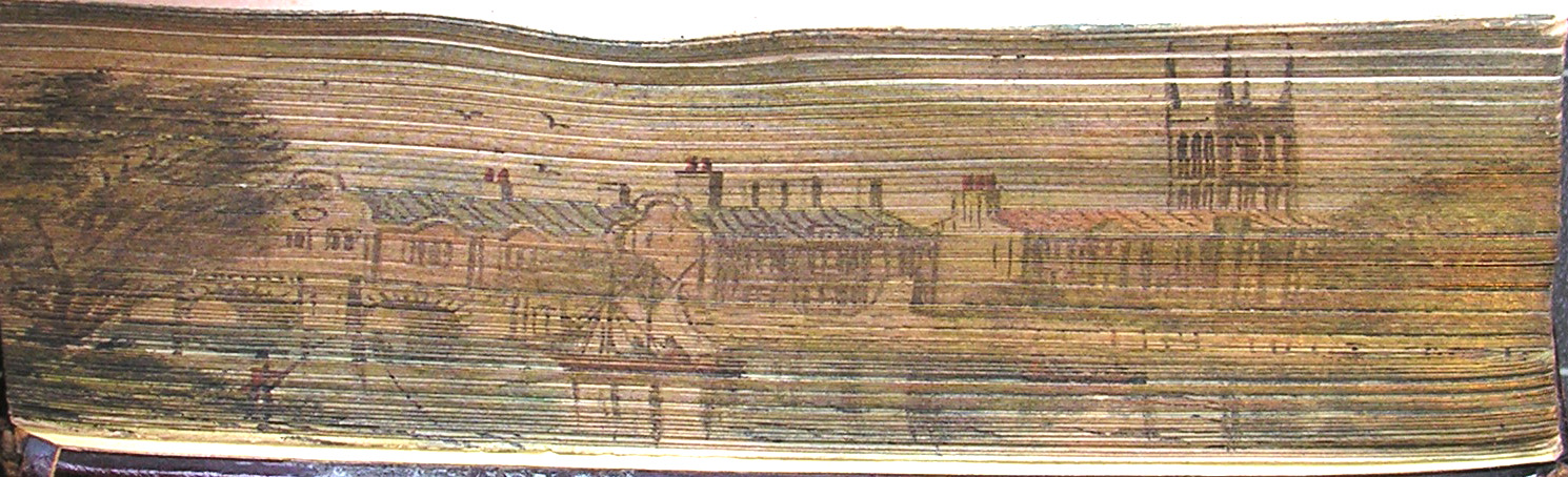 The foreedge of a book with a painted scene of St John's.