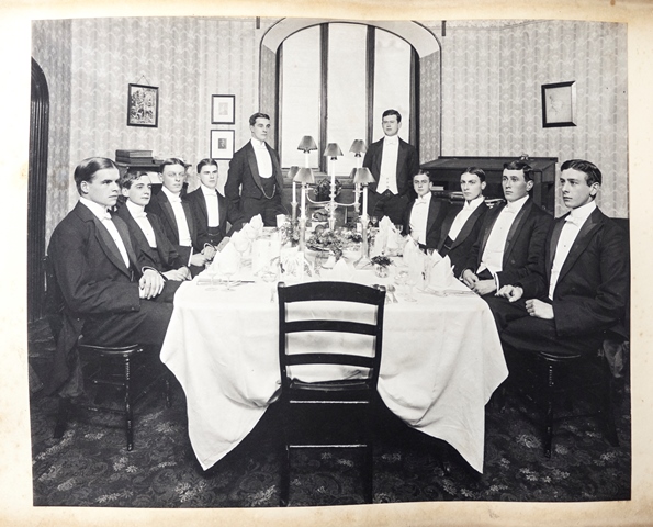 A formal dinner party in a student's room, ca. 1905