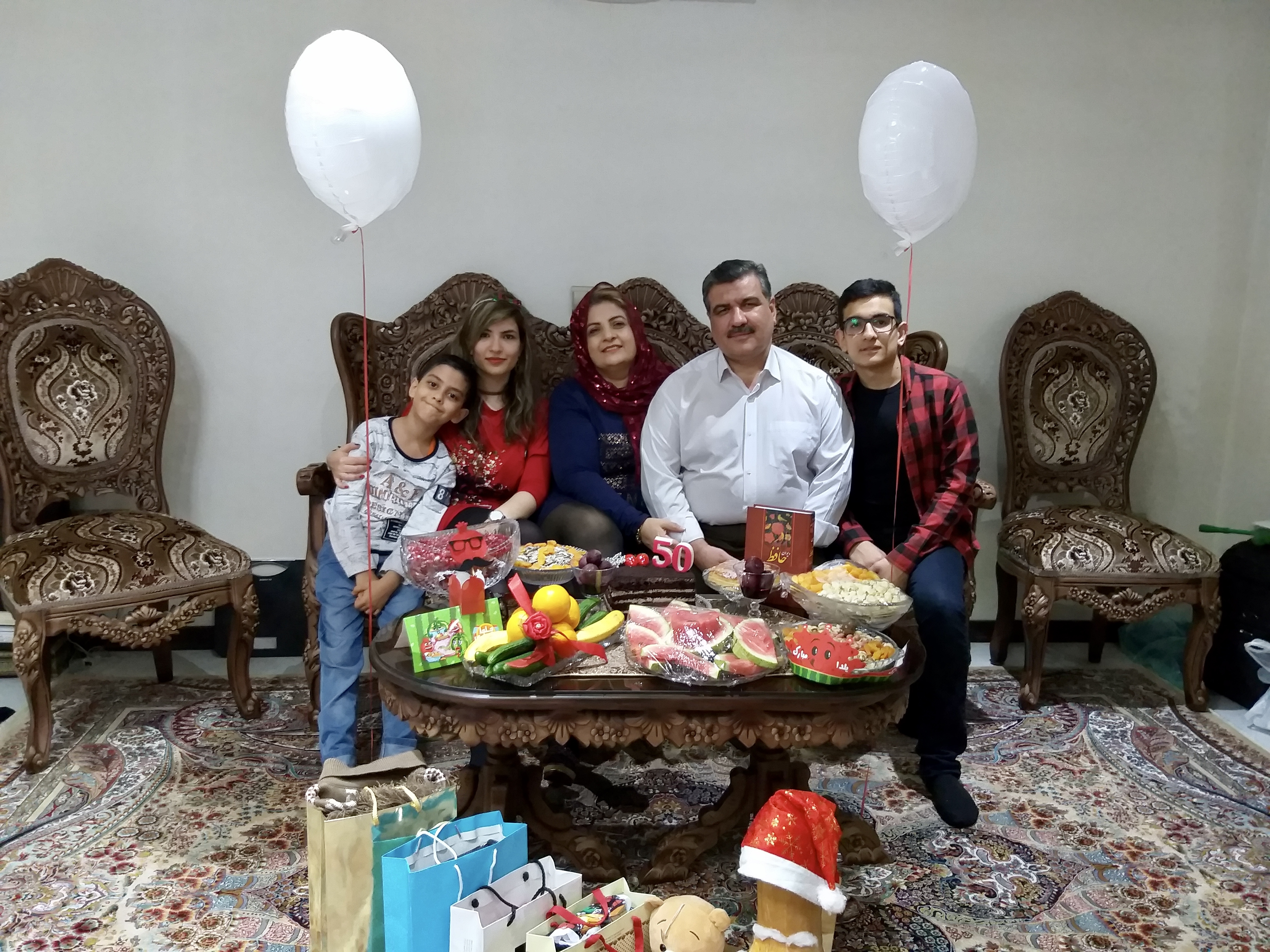 Amir with his family