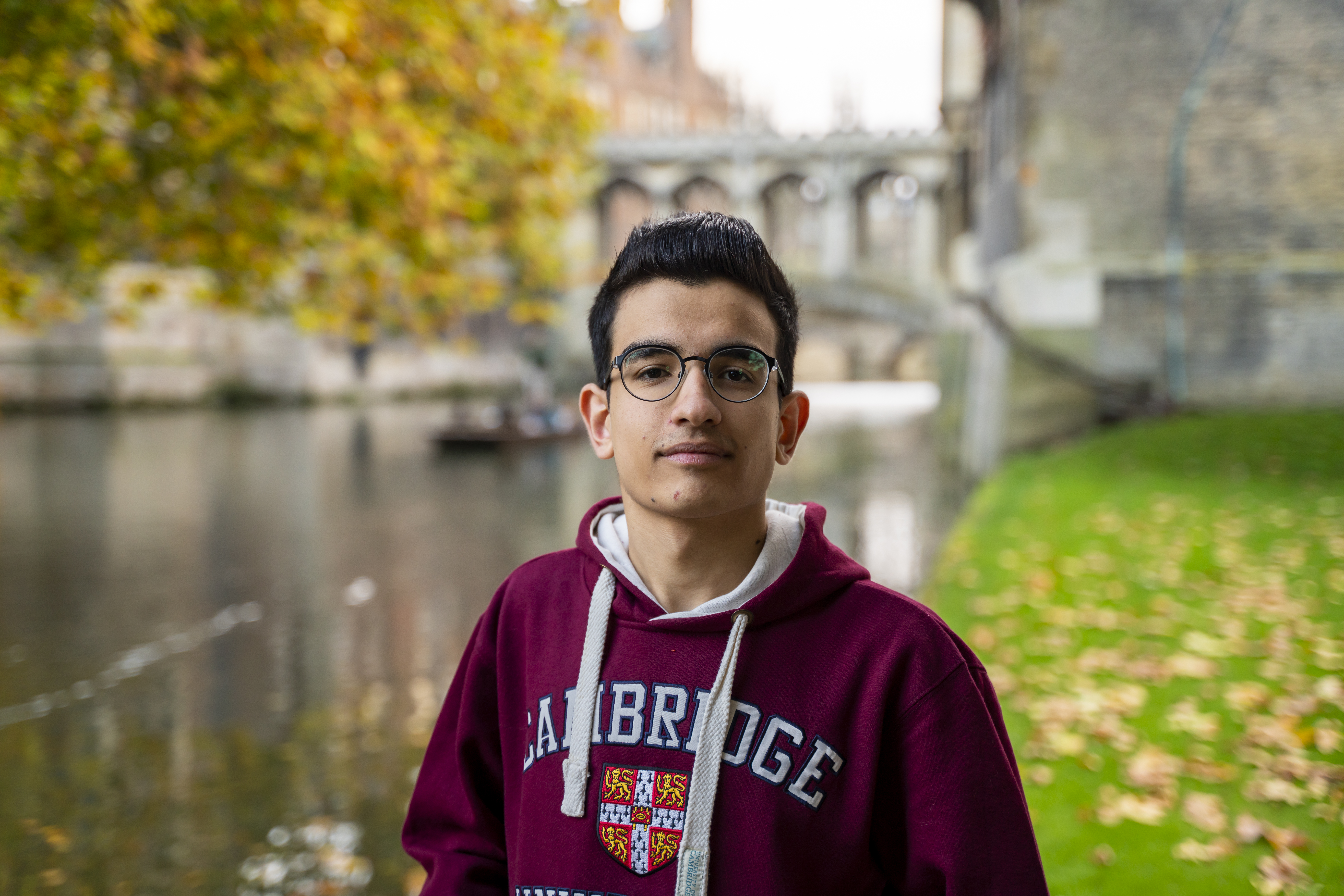 Amir at St John's with the Bridge of Sighs behind