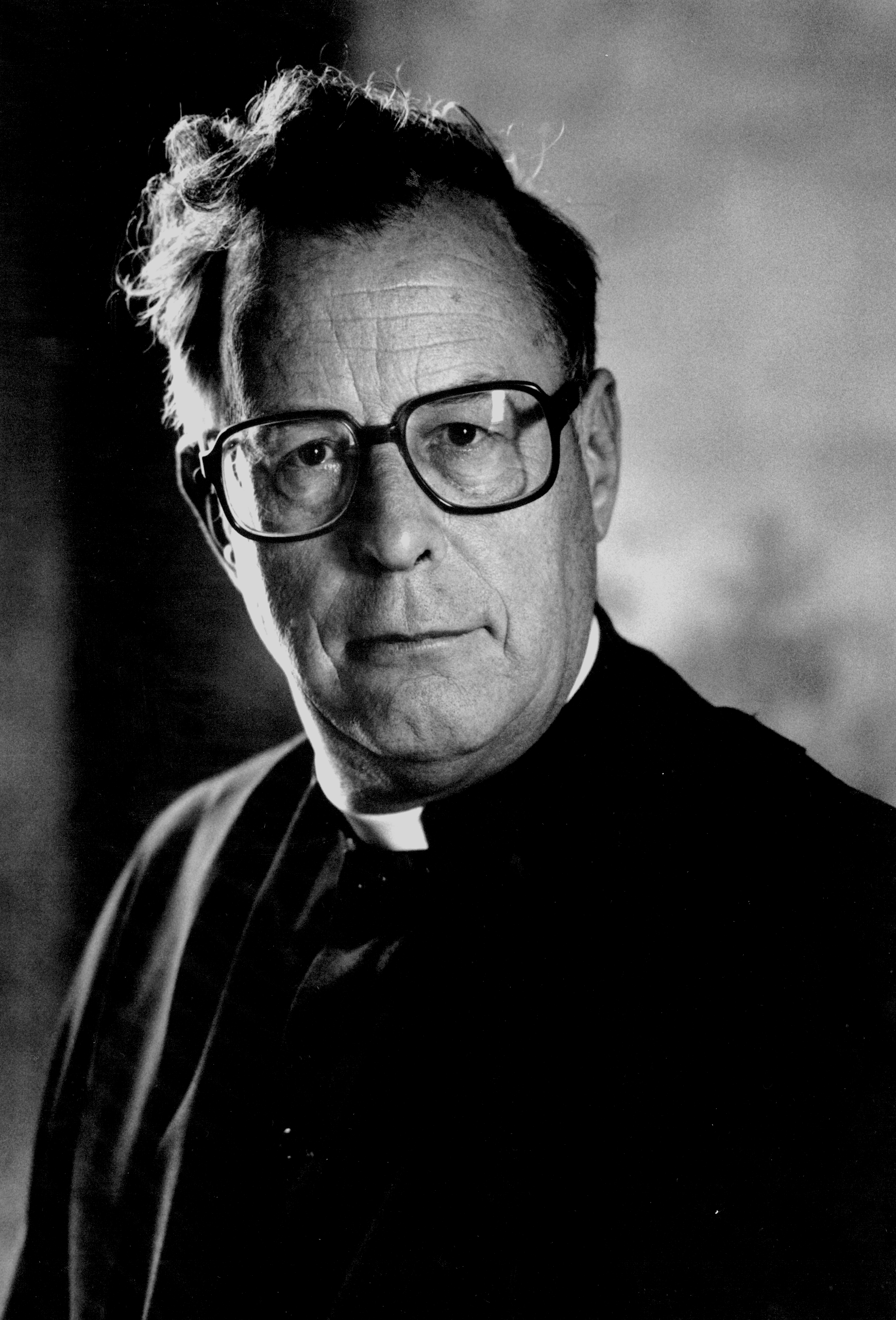 A black and white photo of The Rev'd Dr Andrew Macintosh