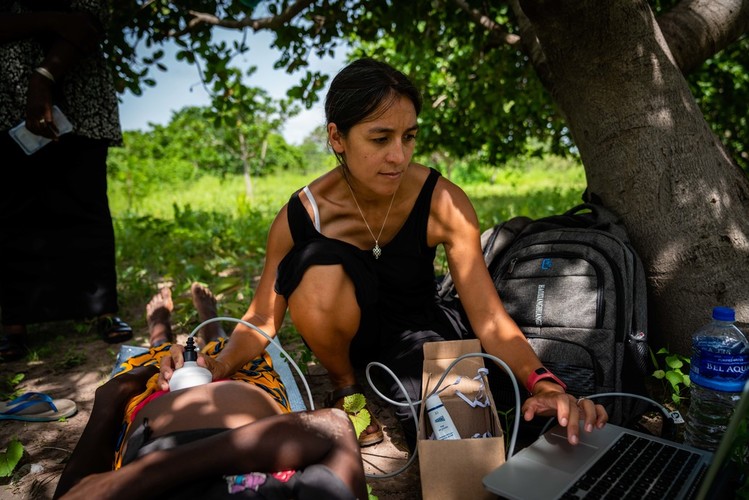 A scientist using equipment in The Gambia