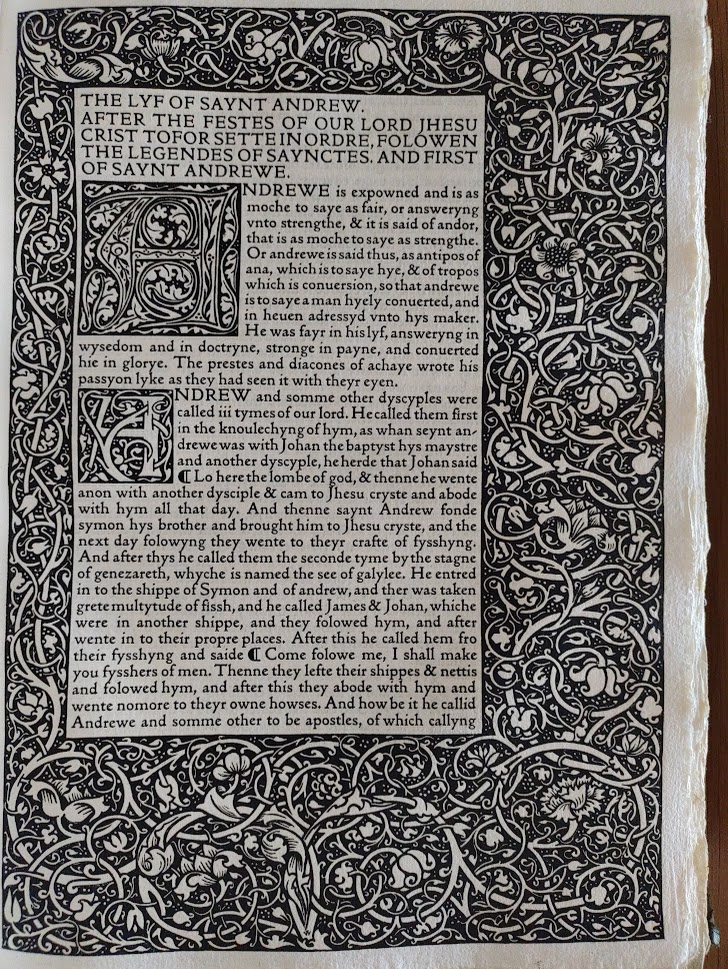 A printed page of 'The Life Of Saint Andrew' with a thick decorative floral border.