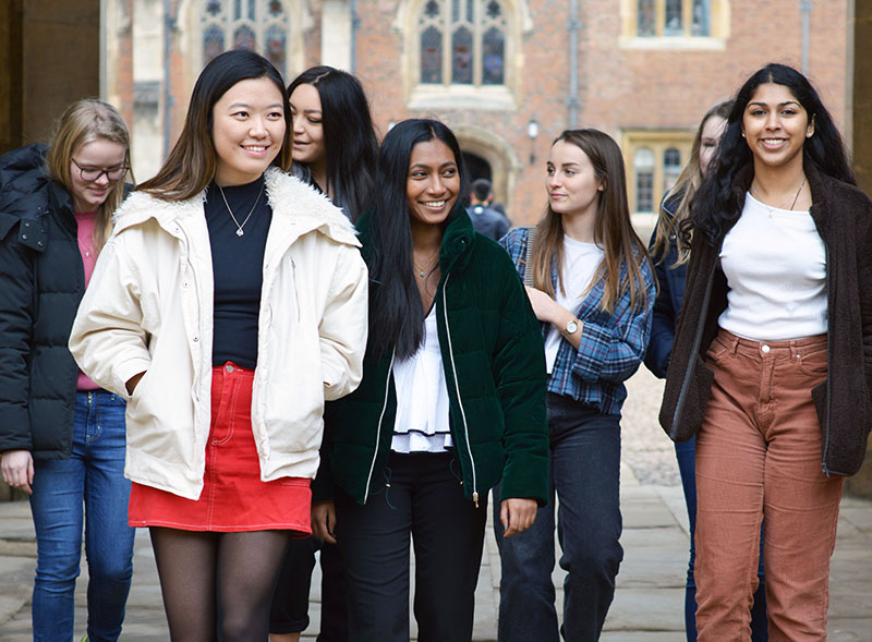 Women of the JCR walking through third court