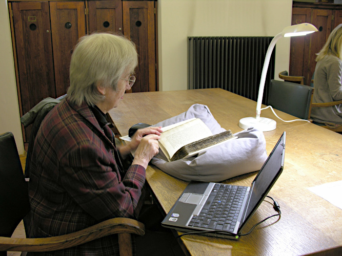 Photograph of a reader in the Rare Books Reading Room.