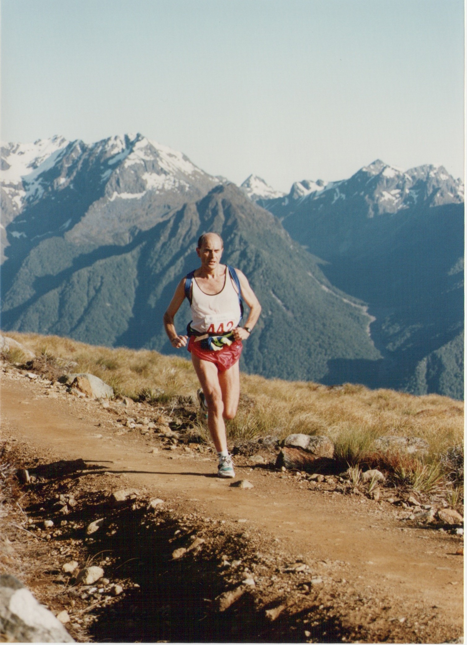 Roger Robinson running among mountains