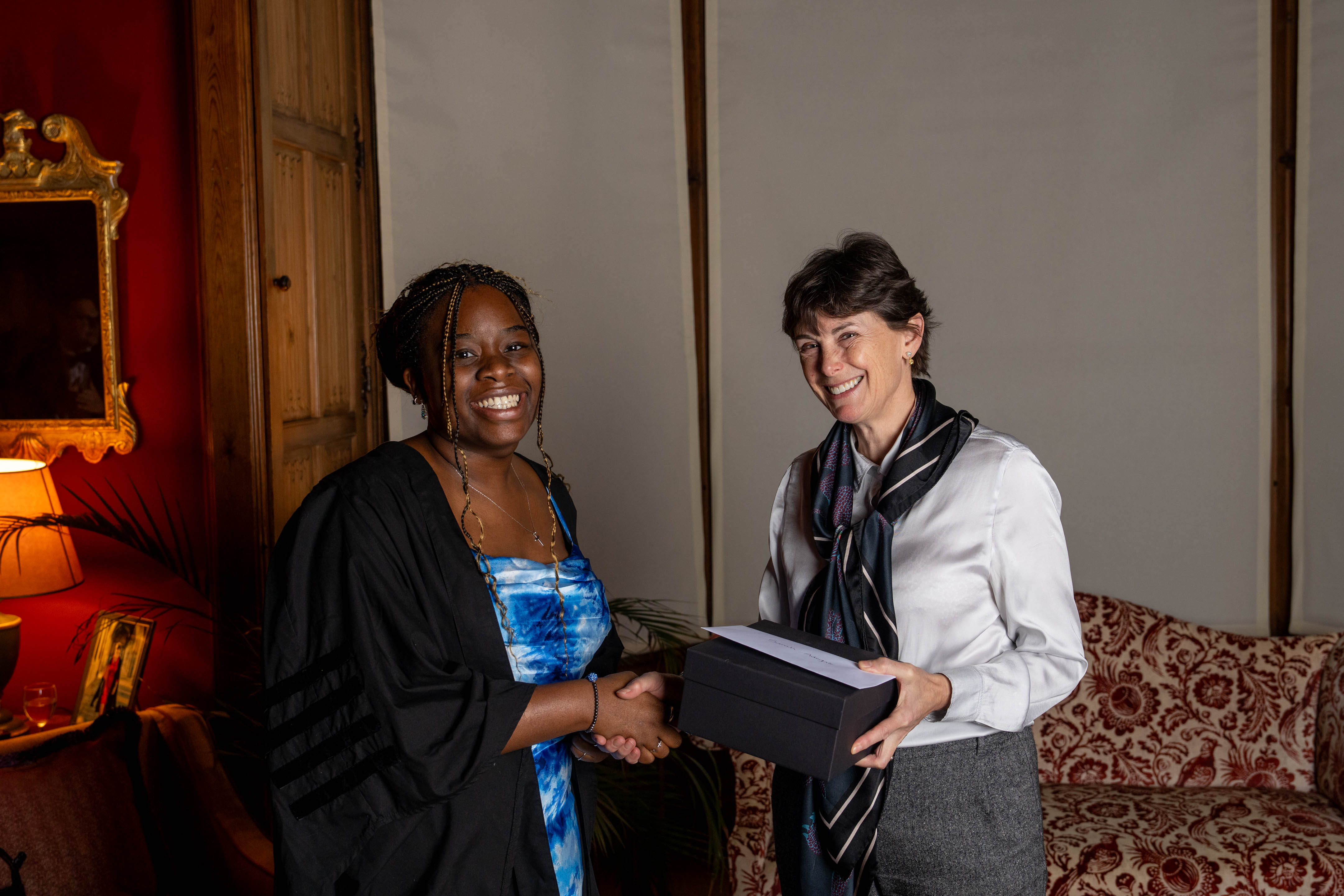 Sarah Abegbite receives her prize from Heather Hancock