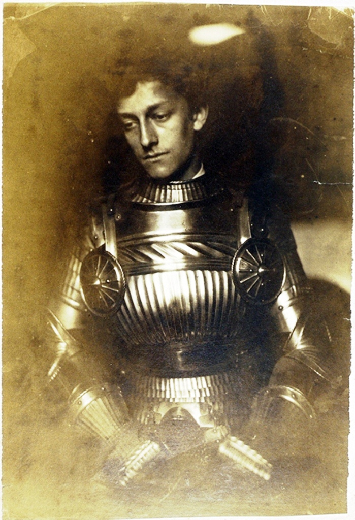 Photographic portrait of a man dressed in a suit of armour