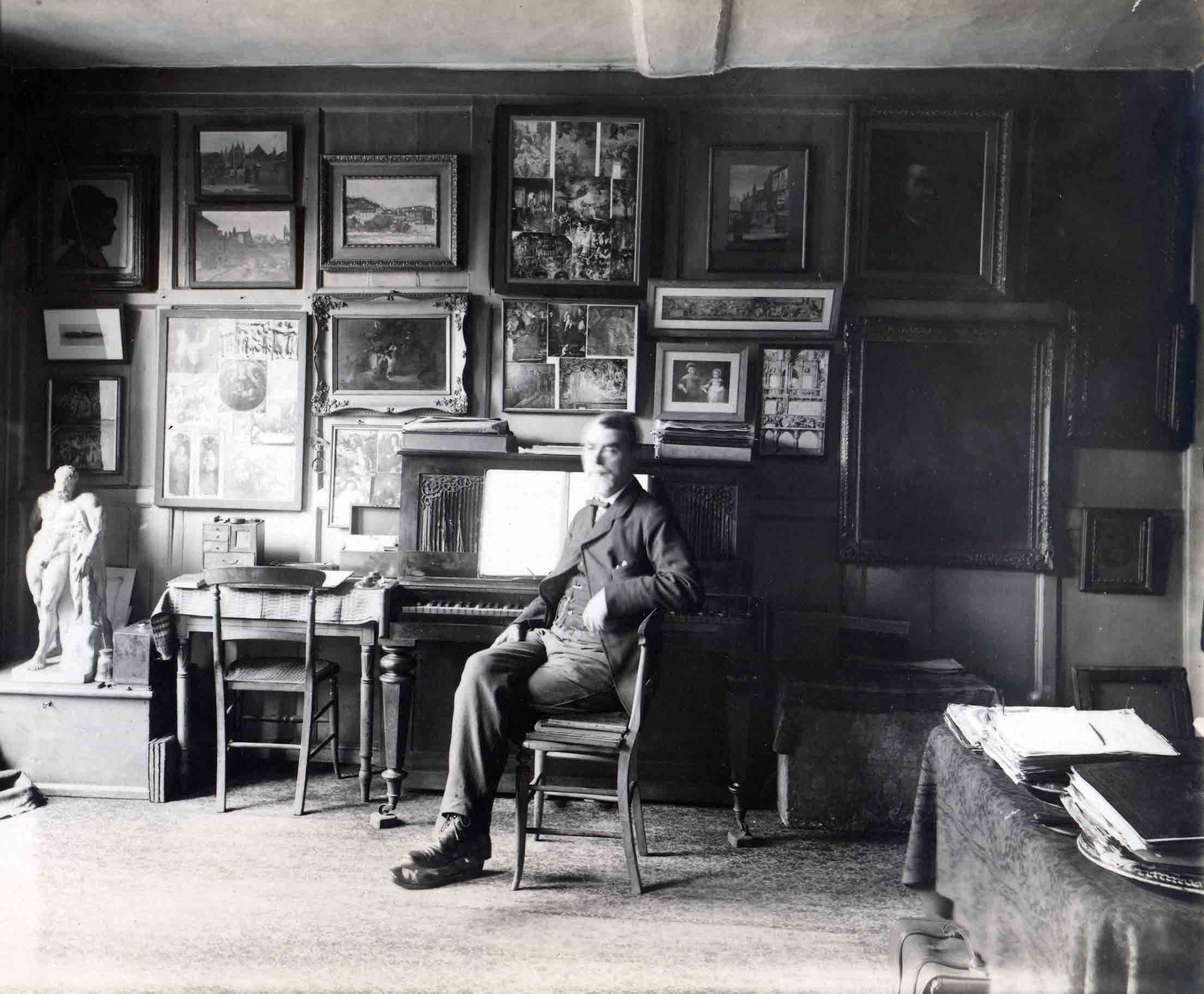 Samuel Butler at the piano in his room at Clifford's Inn