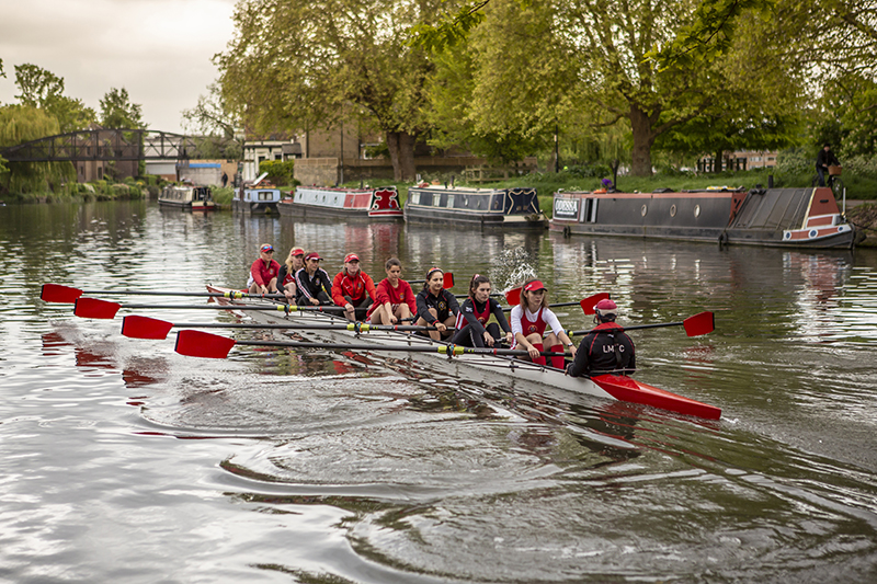 LMBC's W1 boat rows down the River Cam