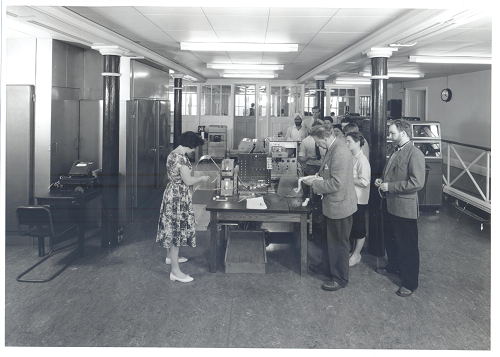 Black and white photograph of early computer laboratory