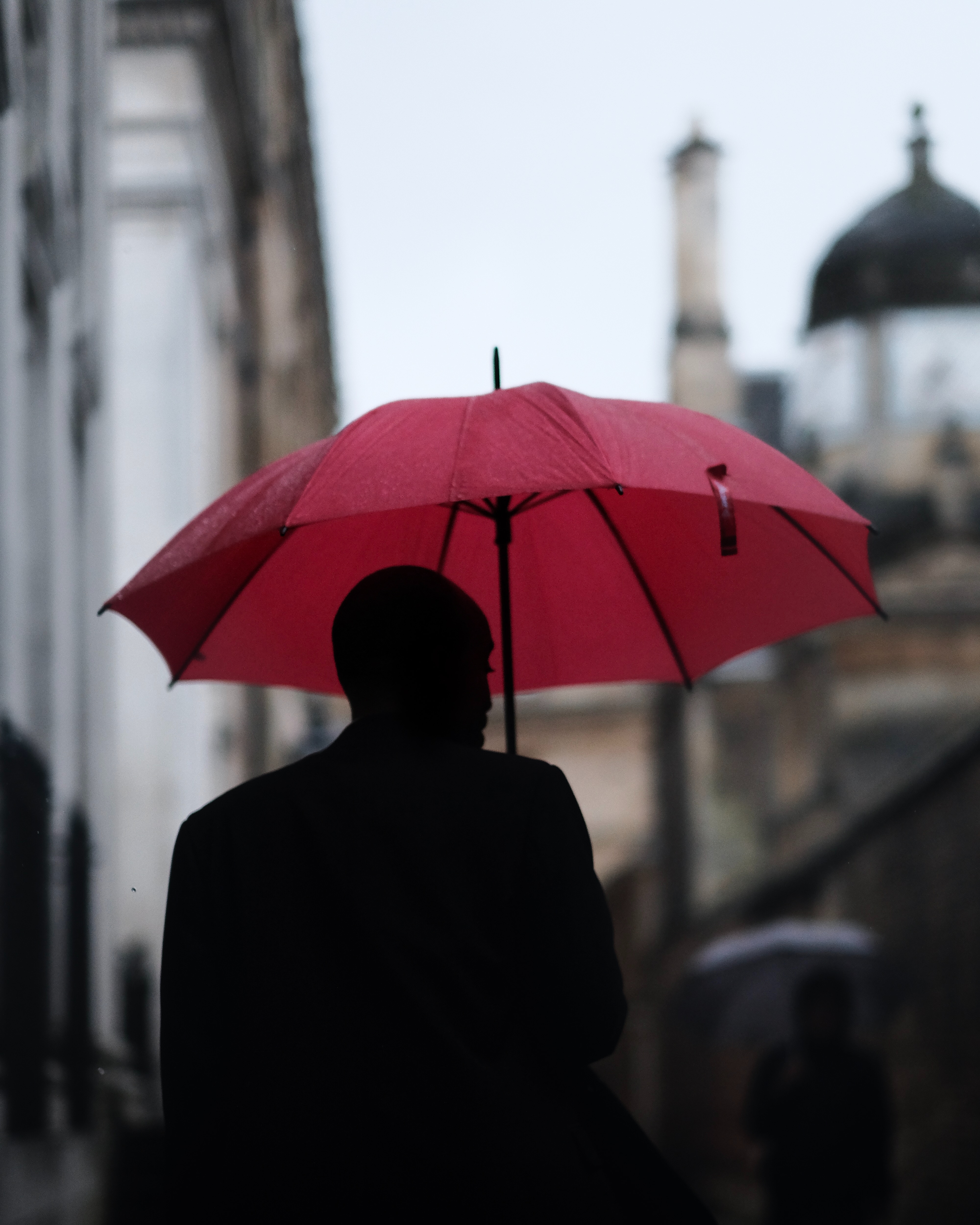 Red umbrella in the rain