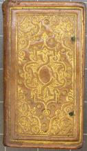 Gold-tooled calfskin binding